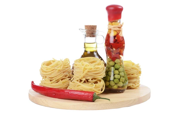 Pasta with an olive oil isolated on white background — Stock Photo, Image