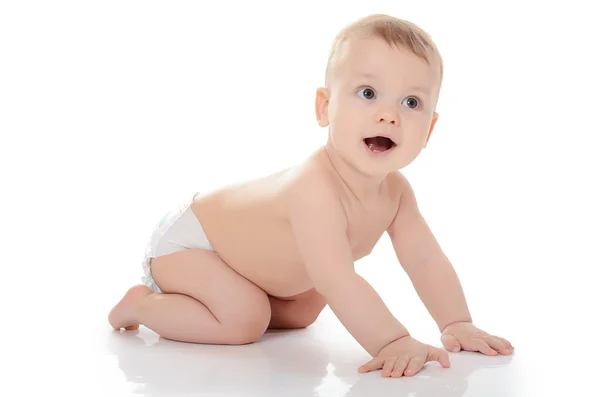 O pequeno bebê isolado no branco — Fotografia de Stock