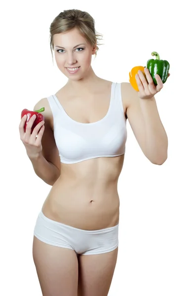 The beautiful girl with fresh pepper — Stock Photo, Image