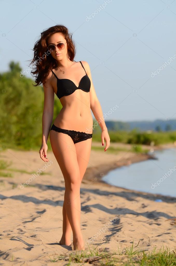The beautiful woman in underwear on a beach Stock Photo by ©voronin-76  31088421