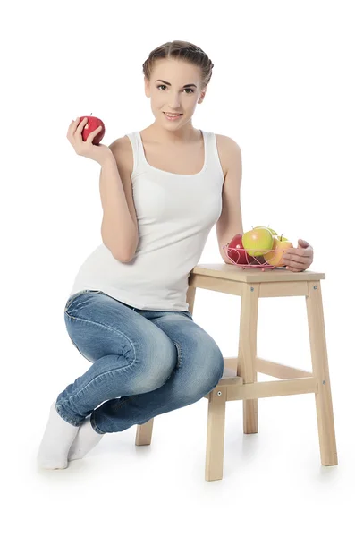 La mujer con manzanas aisladas sobre fondo blanco —  Fotos de Stock