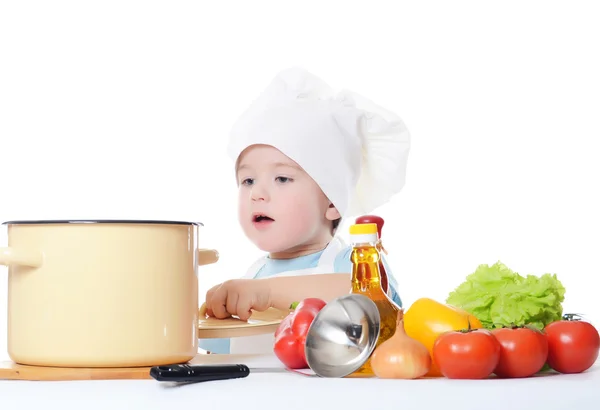 Le petit garçon dans un chapeau du cuisinier — Photo