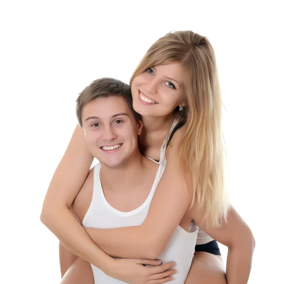 Hermosa pareja joven en el blanco — Foto de Stock