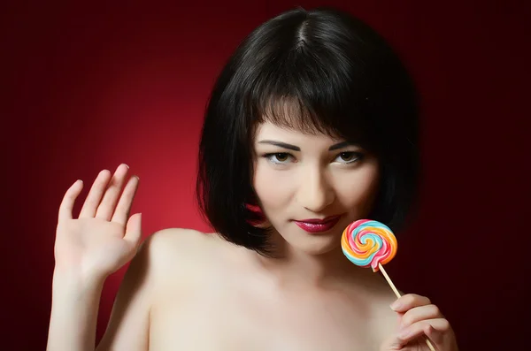 La fille avec un bonbon au sucre — Photo