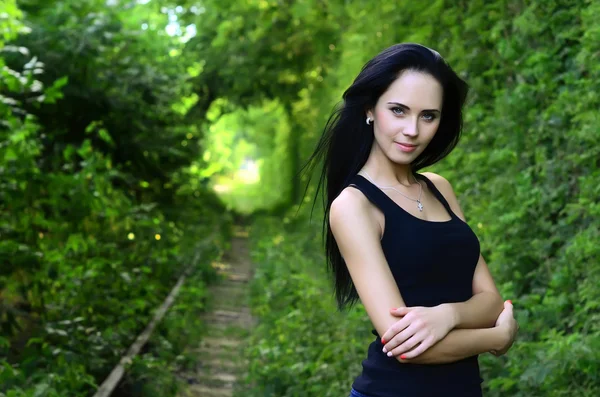 The beautiful girl on old railway — Stock Photo, Image