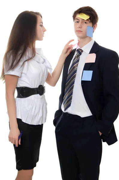 Businesswoman makes notes on businessman — Stock Photo, Image