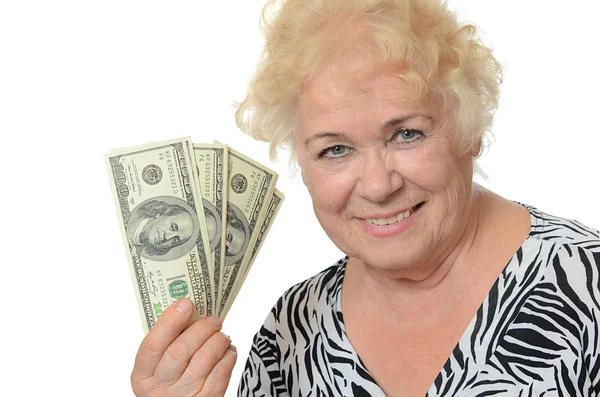 De oudere vrouw met dollars — Stockfoto