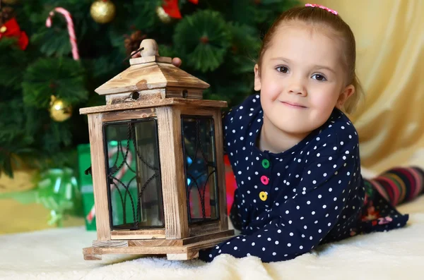 The little girl at christmas fur-tree — Stock Photo, Image