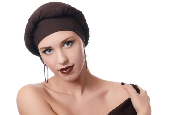 The beautiful woman in a turban with a creative make-up — Stock Photo, Image