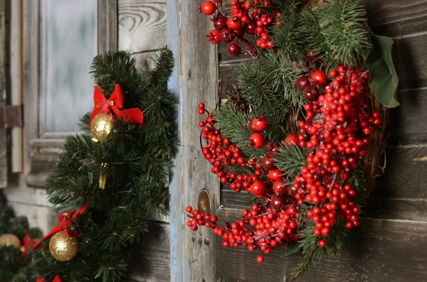 Christmas branch of a fur-tree on a wall — Stock Photo, Image