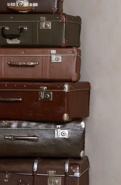 Old retro suitcases at a wall — Stock Photo, Image