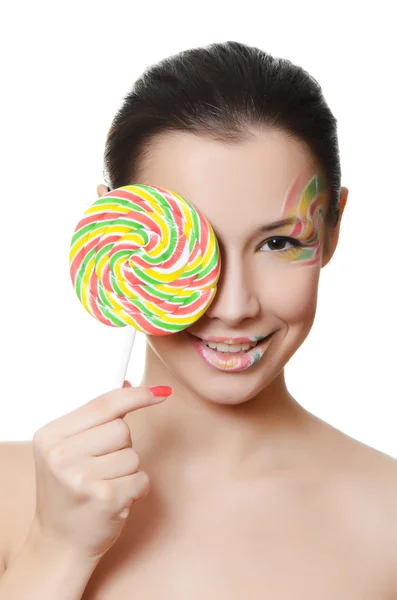 La ragazza con una caramella da zucchero — Foto Stock