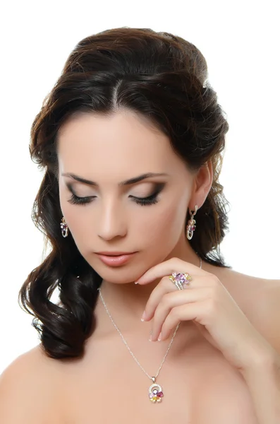 The beautiful woman with expensive jewelry — Stock Photo, Image