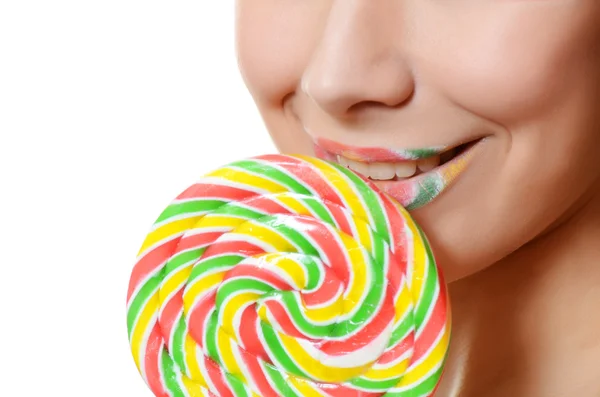 Flicka med en socker-godis — Stockfoto