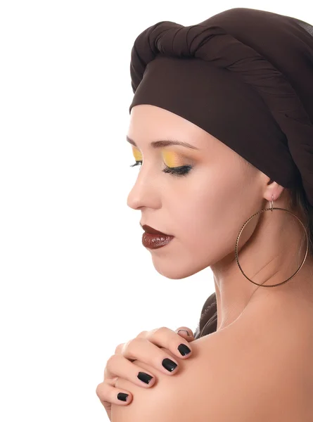 The beautiful woman in a turban with a creative make-up — Stock Photo, Image