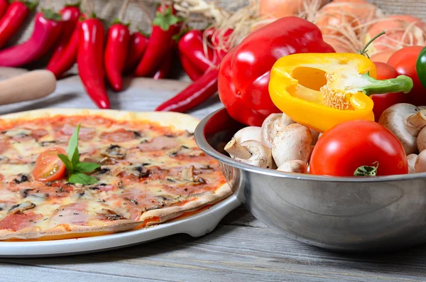 The Italian pizza with olives and salami — Stock Photo, Image