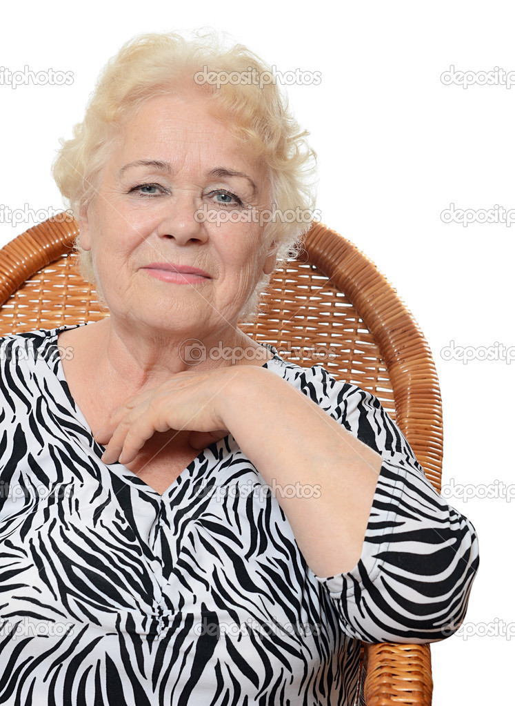 Old woman in an armchair