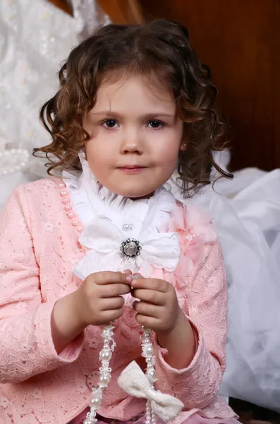 The little girl in vintage interior — Stock Photo, Image