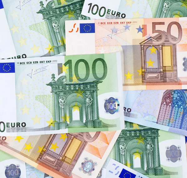 Billetes en euros como telón de fondo, primer plano — Foto de Stock