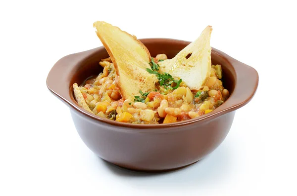 Soup from vegetables and a string bean with dried grain chips — Stock Photo, Image