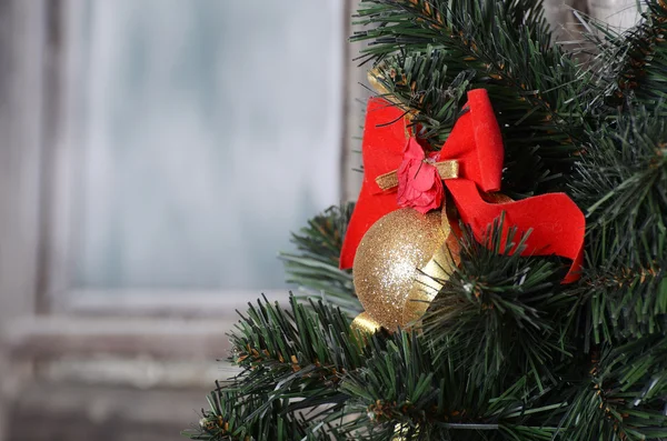 Christmas branch of a fur-tree on a wall — Stock Image Christmas branch of a fur-tree on a wall Stock Image