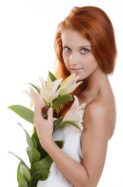 Girl with pink lilies — Stock Photo, Image