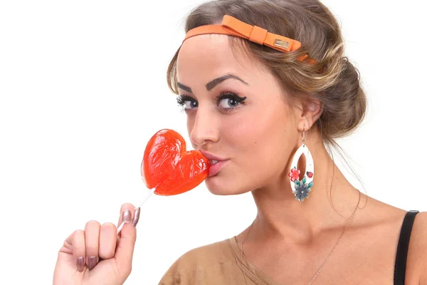 Beautiful girl with a lollipop — Stock Photo, Image