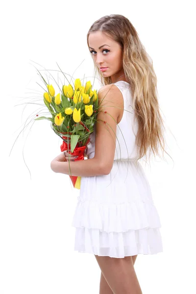 Glückliche Frau mit gelben Tulpen — Stockfoto