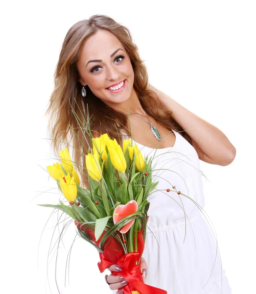 Happy woman with yellow tulips — Stock Photo, Image