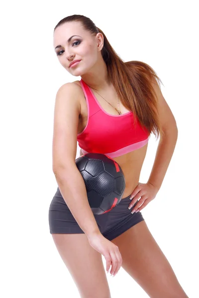 La bella bruna in abbigliamento sportivo con — Foto Stock