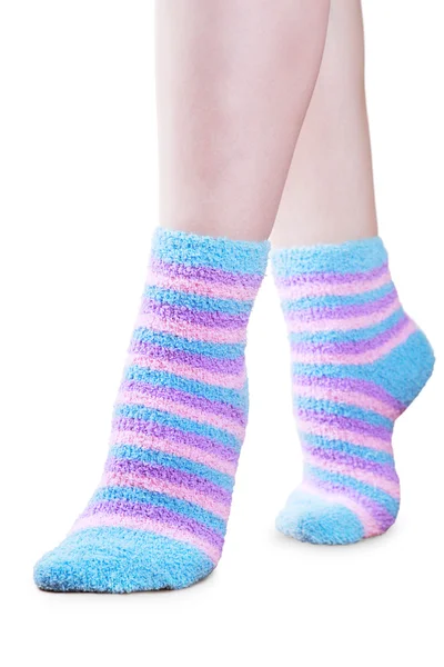 Пушистые полосатые носки — стоковое фото