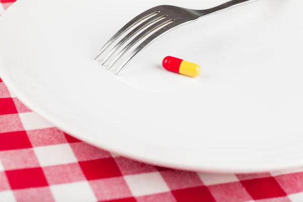 Pille auf dem Teller — Stockfoto