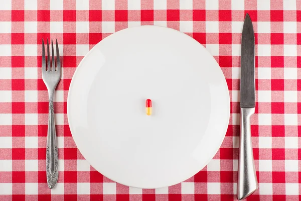 Pill on a plate — Stock Photo, Image