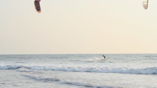 Kiteboarder enjoy surfing in the sea — Stock Video