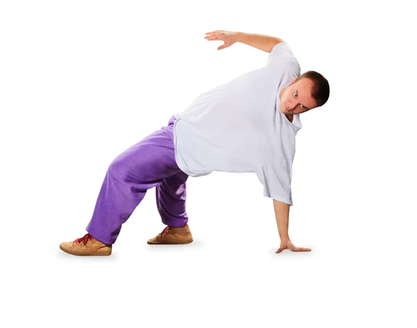 Hip hop dancer balancing on hands isolated over white background — Stock Photo, Image