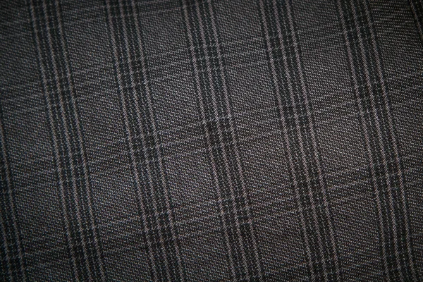 Szary tkanina w pewien klatka z bliska — Zdjęcie stockowe