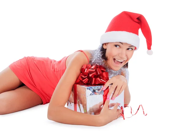 Santa woman lie with gift box over white — Stock Photo, Image