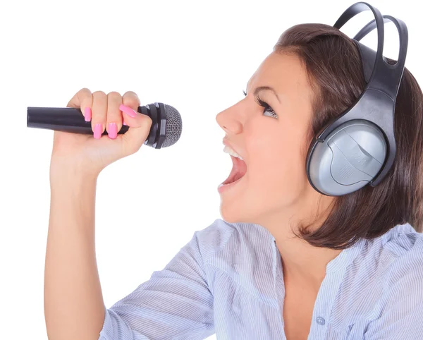 Female singing in to microphone. — Stock Photo, Image