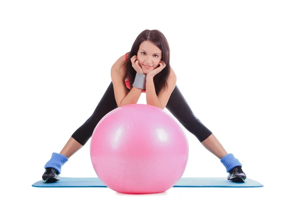 Young female with fitball over white — Stock Photo, Image