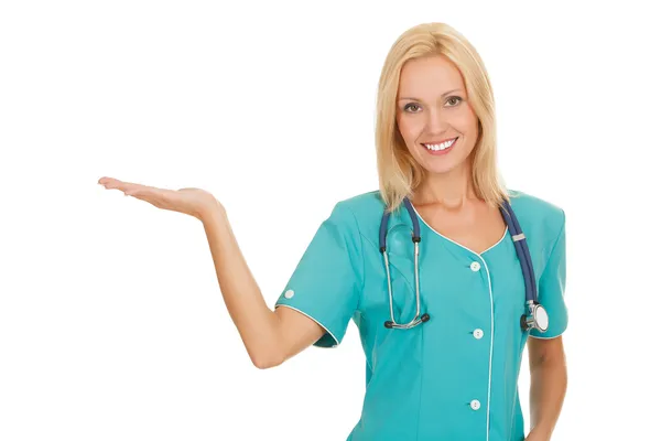 Female doctor holding something on her hand — Stock Photo, Image