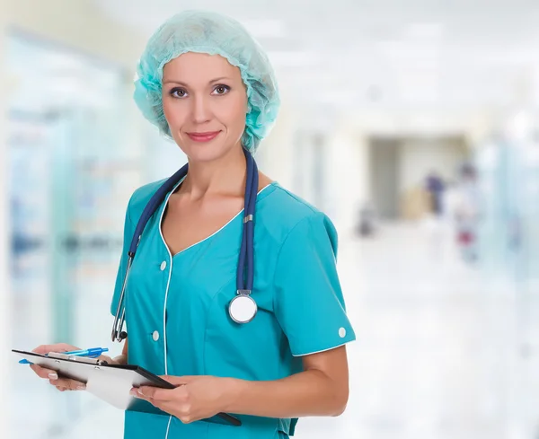 Médico médico mujer en el consultorio —  Fotos de Stock