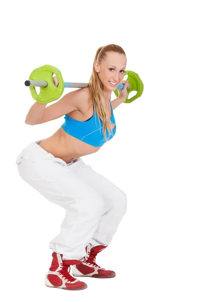 Mujer joven entrenamiento con pesas — Foto de Stock