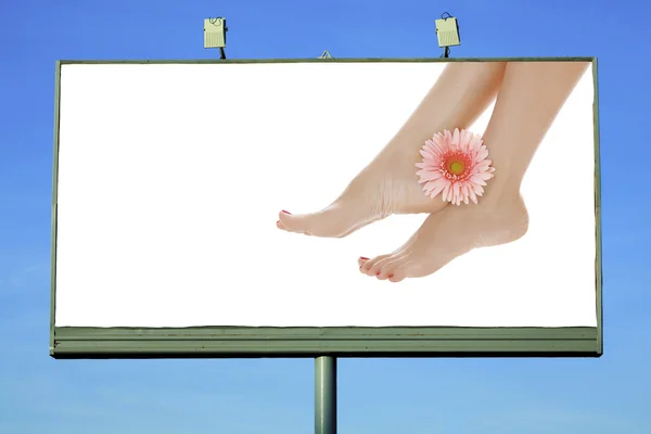 Legs on street billboard — Stock Photo, Image