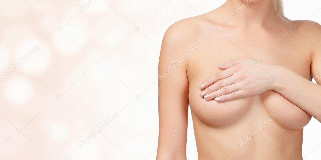 female breast on blurred background