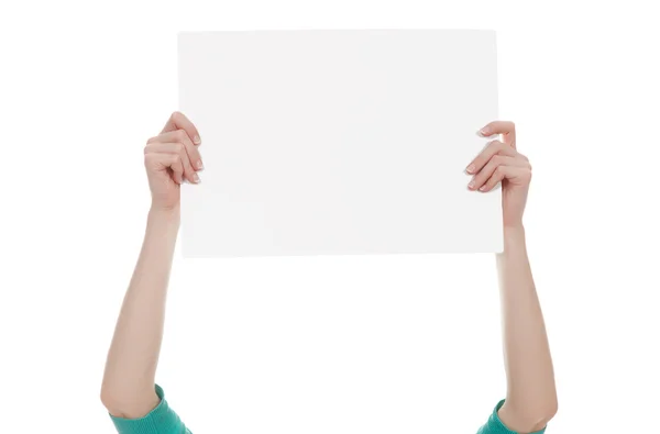 Manos sosteniendo un papel blanco en blanco — Foto de Stock