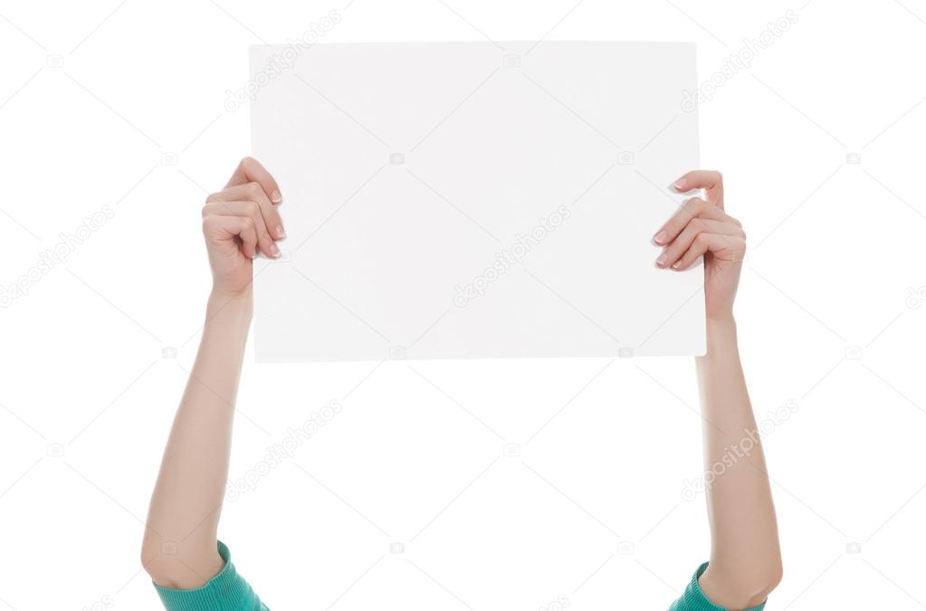 hands holding a blank white paper