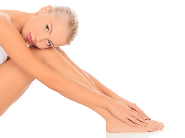 Young woman sitting on floor — Stock Photo, Image