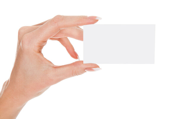 Female hand with an empty white card