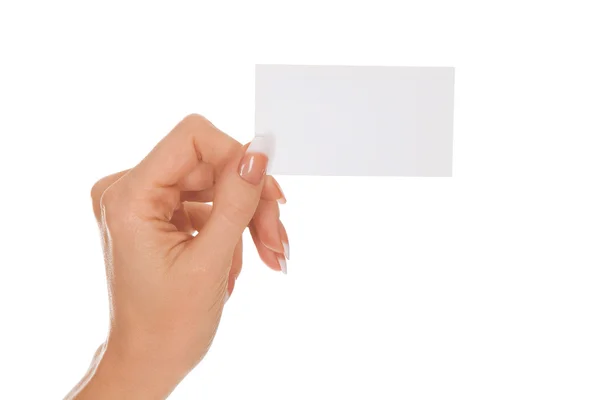 Mano de mujer sosteniendo una tarjeta vacía, fondo blanco — Foto de Stock