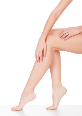 Smooth skin on female legs. clipart
